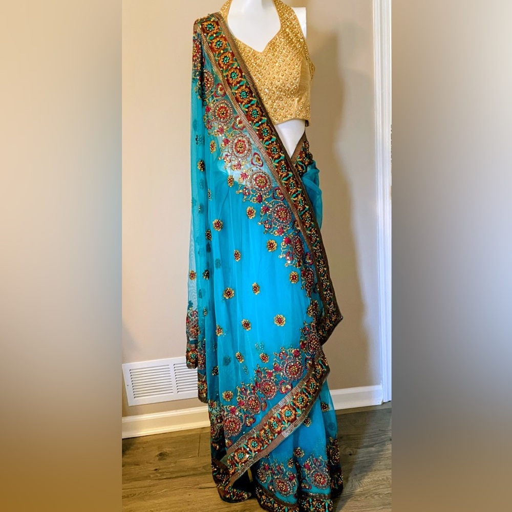 Embellished Teal Saree with Gold Blouse